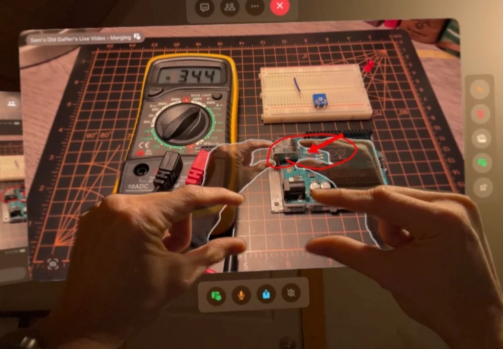 Merged Reality on Vision Pro. Ghost hands and a red annotation sit on a live view of a bench.